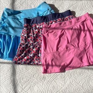 Set of Three Athletic Skirts in Blue, Pink, and Patterned